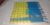 Kanjivaram Semi Silk Small Checks Cotton Sarees Pineapple Yellow w/ Cerulean Blue Color